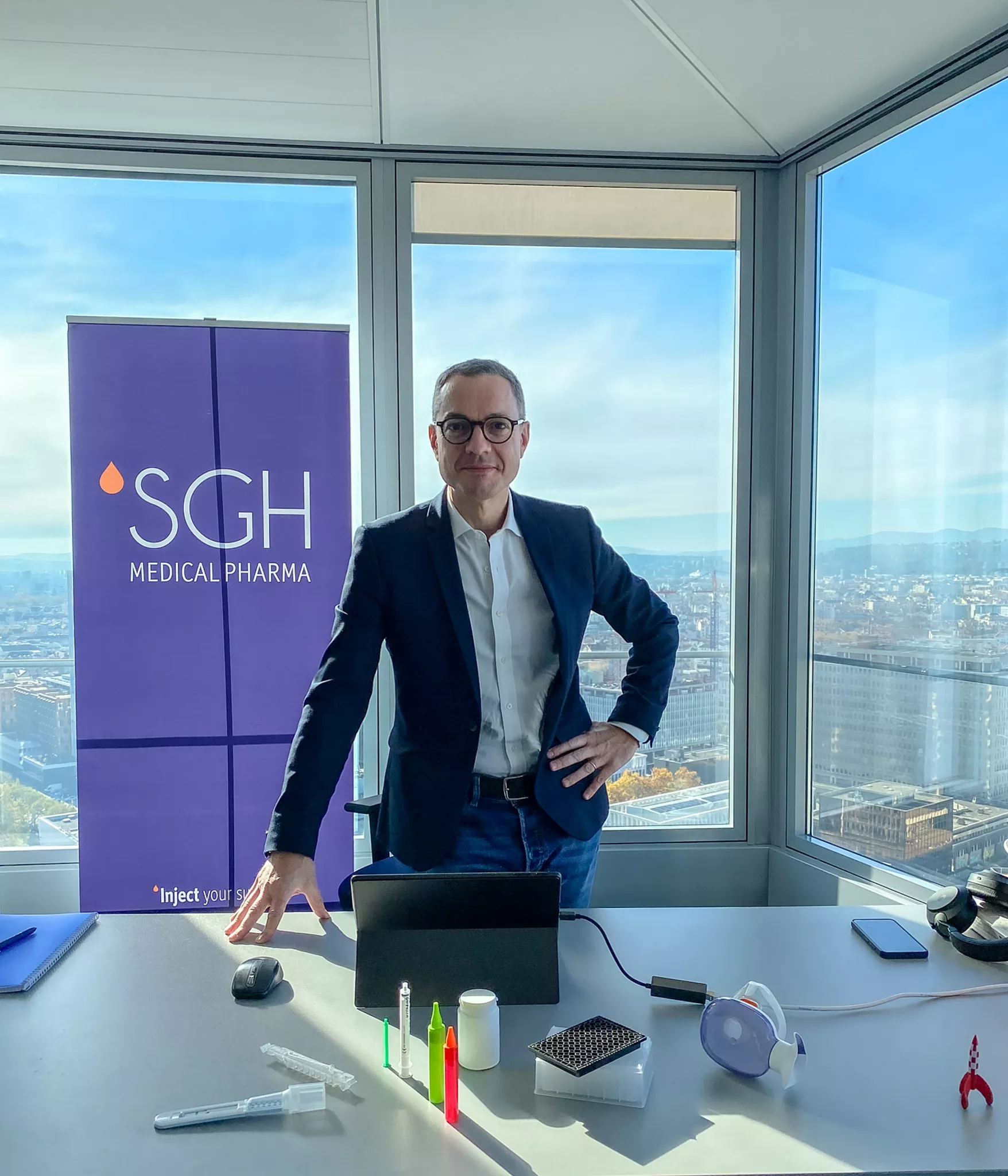 Picture of Olivier Derouard CEO of SGH Medical Pharma at his desk